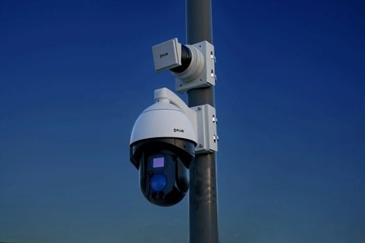 a flir elara camera mounted on to a street pole