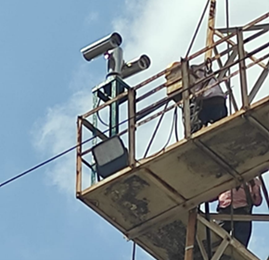 a thermal camera in a pt housing installed on a construction tower