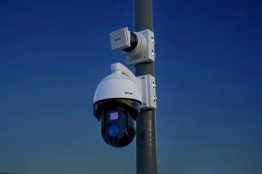 a flir elara camera attached to a street pole
