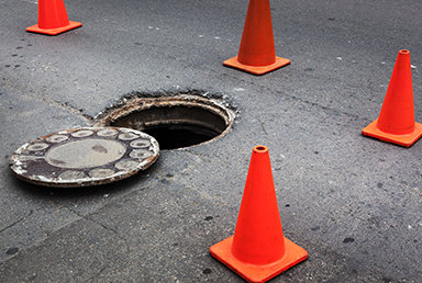 uncovered manhole.jpg
